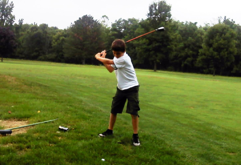 8_Young_scout_Evan_Williams_from_Troop_42_with_his_backswing.jpg